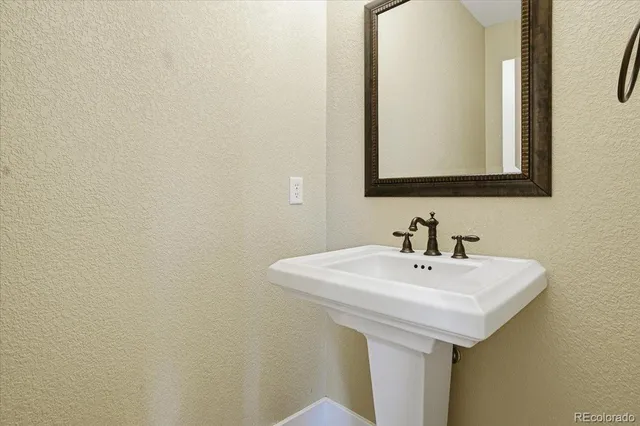 a view of living room with furniture and a flat screen tv