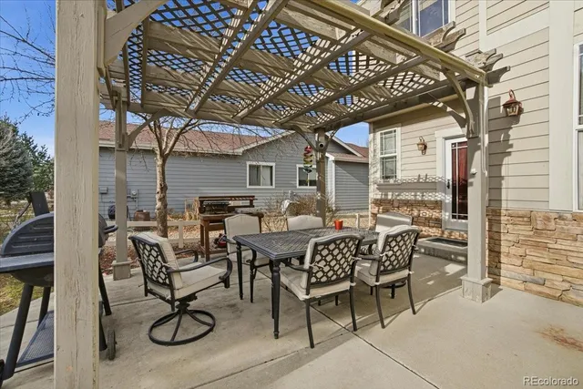 a view of a chairs and tables in the patio