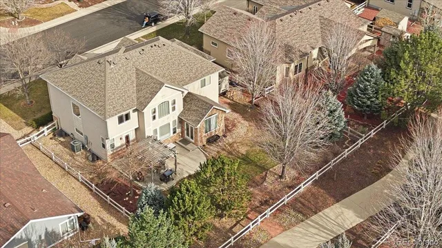 an aerial view of residential building and ocean view