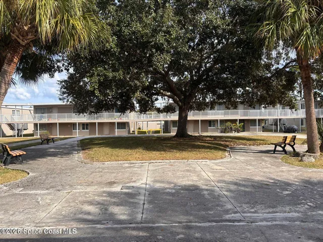 a view of a house with swimming pool