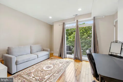 a living room with a couch and a table