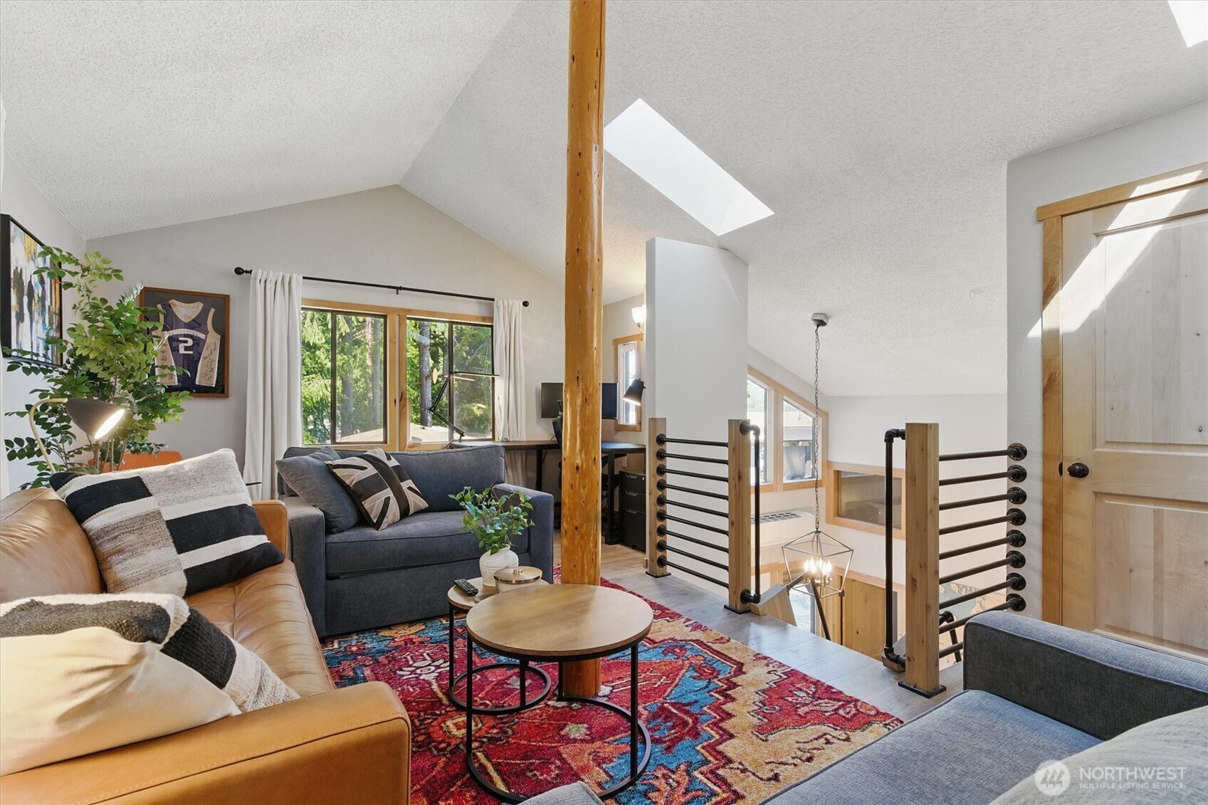 6570 East Grapeview Loop Road Allyn, WA 98524 - Photo 25 of 38 a living room with furniture and wooden floor
