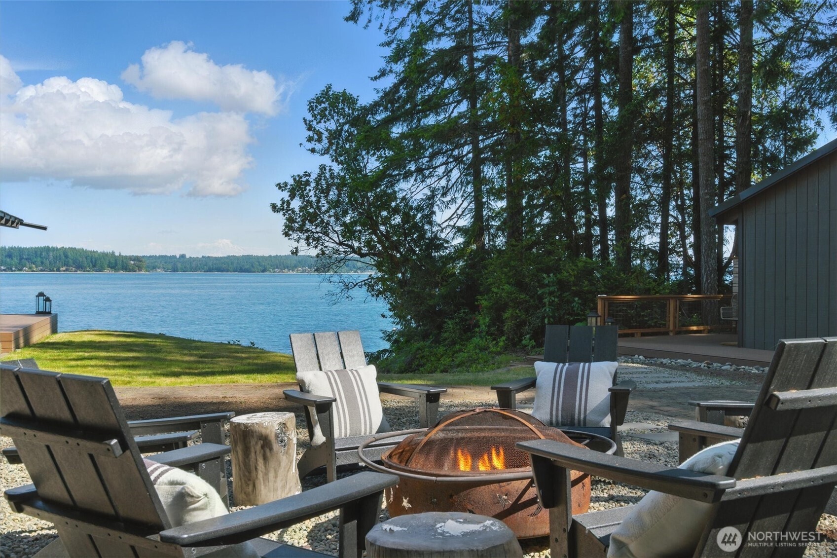 6570 East Grapeview Loop Road Allyn, WA 98524 - Photo 32 of 38 a view of a swimming pool with a patio