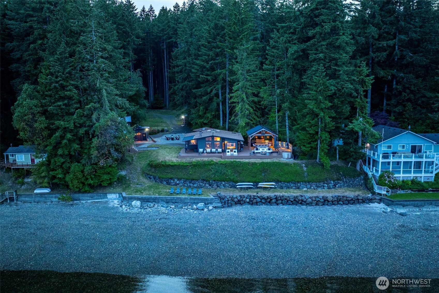 6570 East Grapeview Loop Road Allyn, WA 98524 - Photo 35 of 38 a green field covered with trees