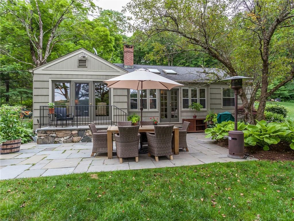3 West Morris Road Washington, CT 06794 - Photo 1 of 1 a view of a house with backyard and sitting area