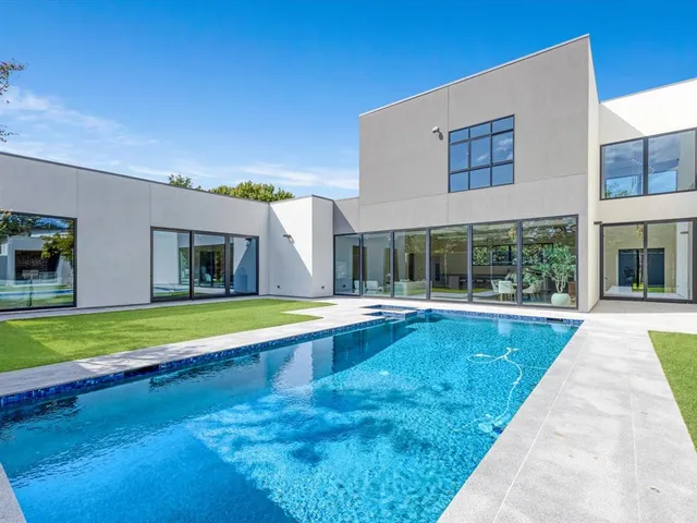 a view of swimming pool with a yard