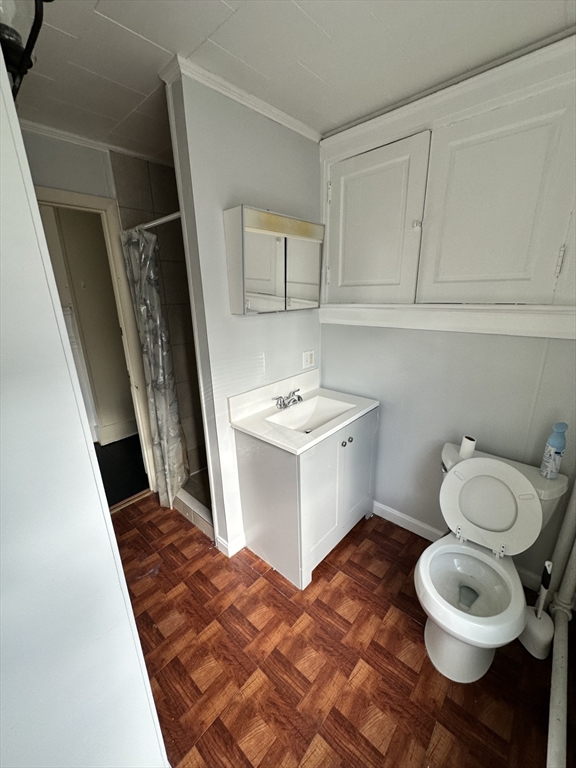 3 Marston Way Worcester, MA 01609 - Photo 21 of 25 a bathroom with a sink a toilet and a mirror