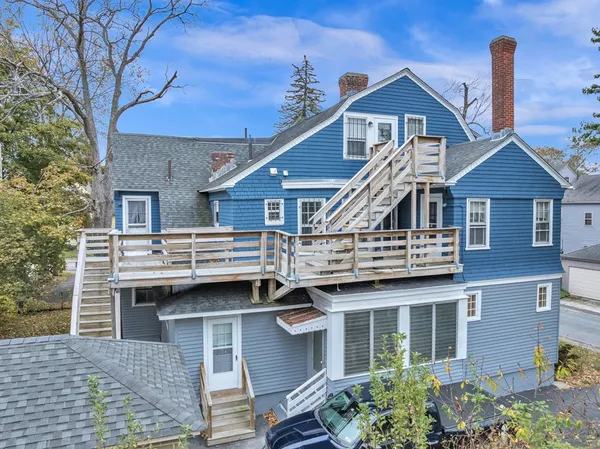 a front view of a house with garage