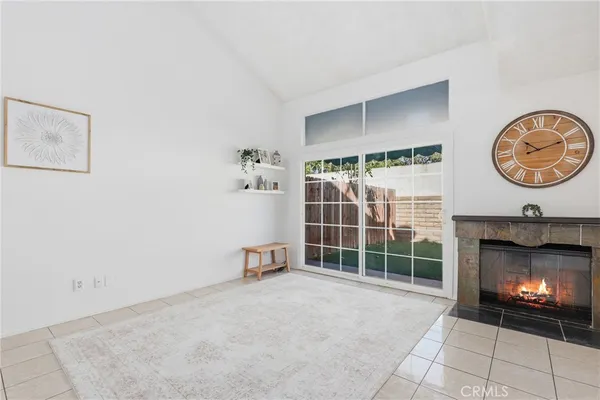 a front view of a house with a road