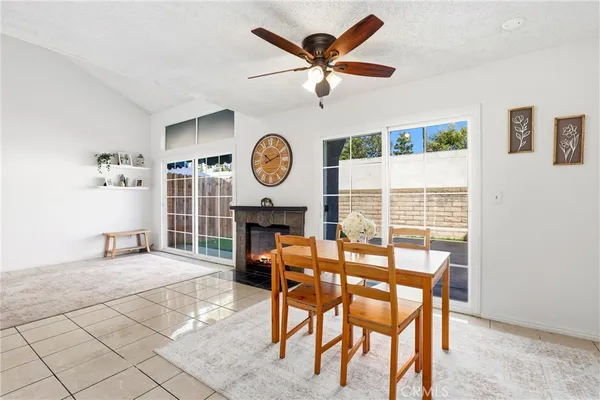 a kitchen with stainless steel appliances granite countertop a stove and a microwave