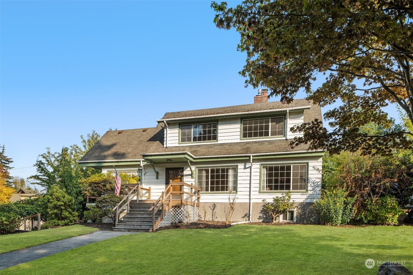 7518 Orin Court North Seattle, WA 98103 - Photo 1 of 40 a front view of house with yard and green space