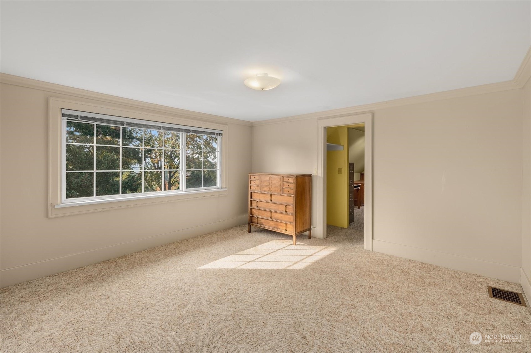 7518 Orin Court North Seattle, WA 98103 - Photo 25 of 40 a view of an empty room with a window
