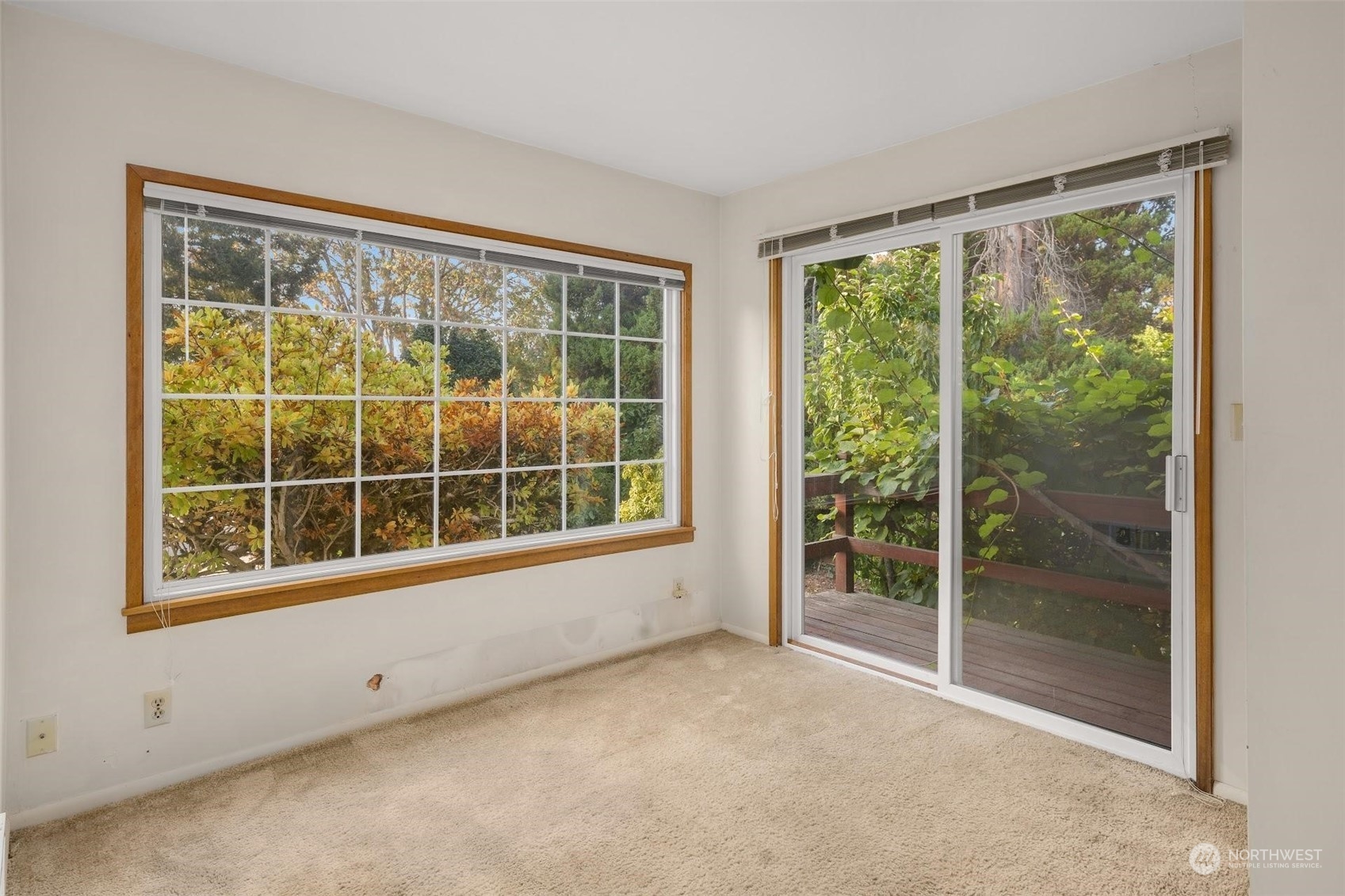 7518 Orin Court North Seattle, WA 98103 - Photo 27 of 40 a view of an empty room with a large window