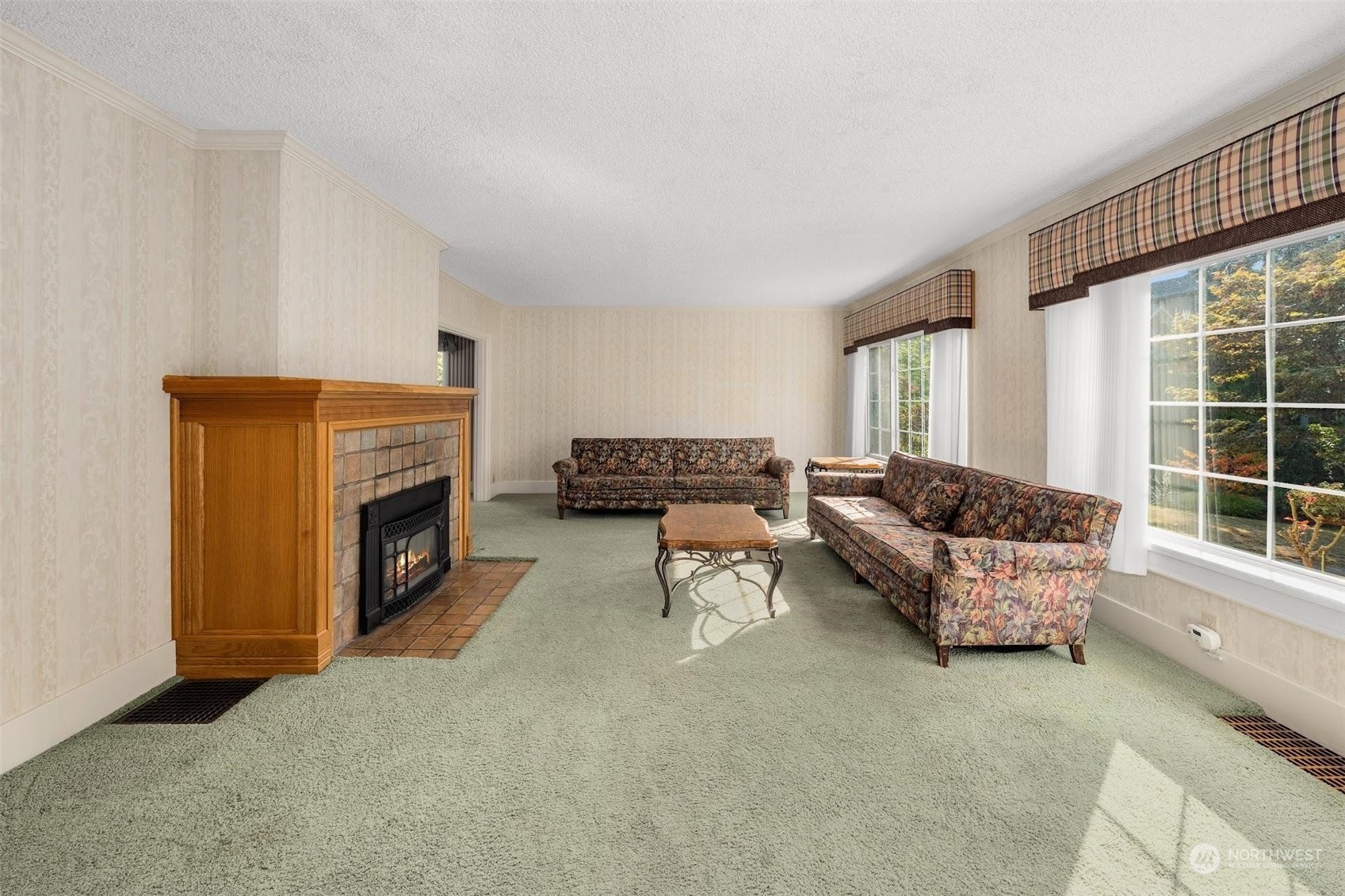 7518 Orin Court North Seattle, WA 98103 - Photo 35 of 40 a living room with furniture and a fireplace