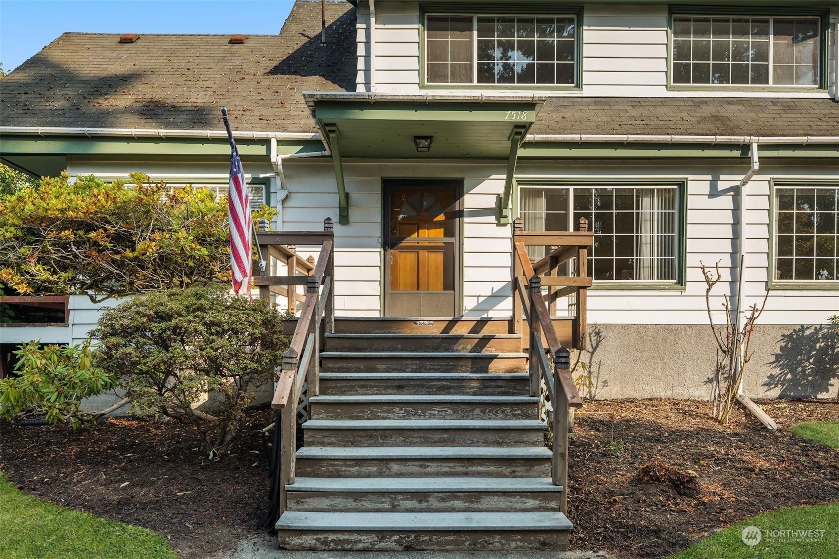 7518 Orin Court North Seattle, WA 98103 - Photo 39 of 40 a front view of a house with a porch