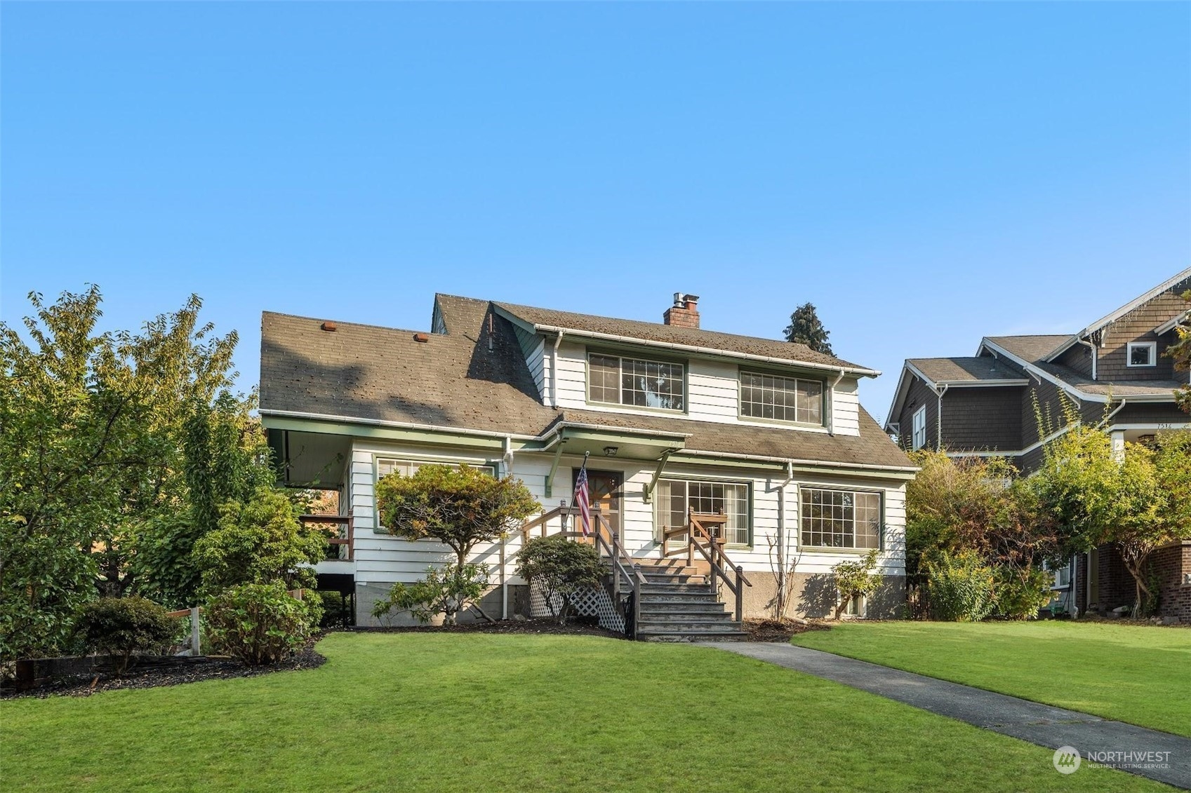 7518 Orin Court North Seattle, WA 98103 - Photo 40 of 40 a front view of a house with a yard