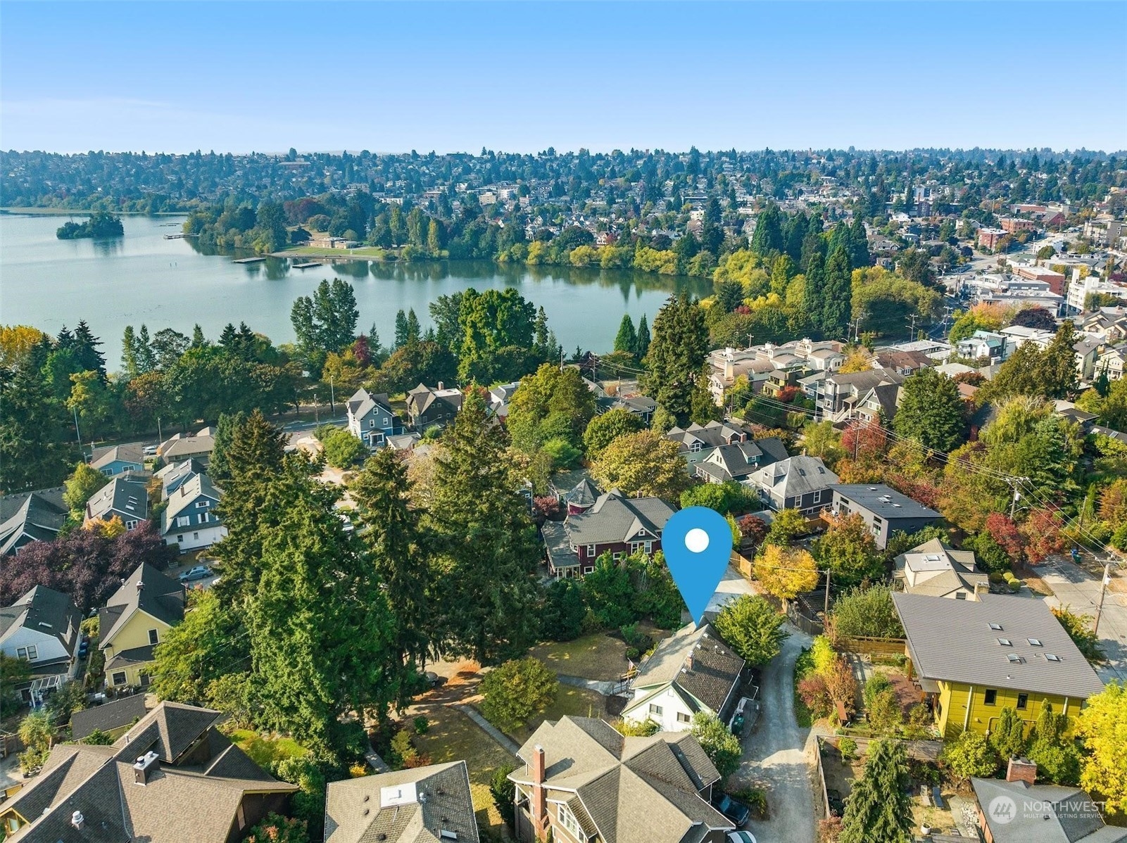 7518 Orin Court North Seattle, WA 98103 - Photo 5 of 40 a view of lake and houses with outdoor space