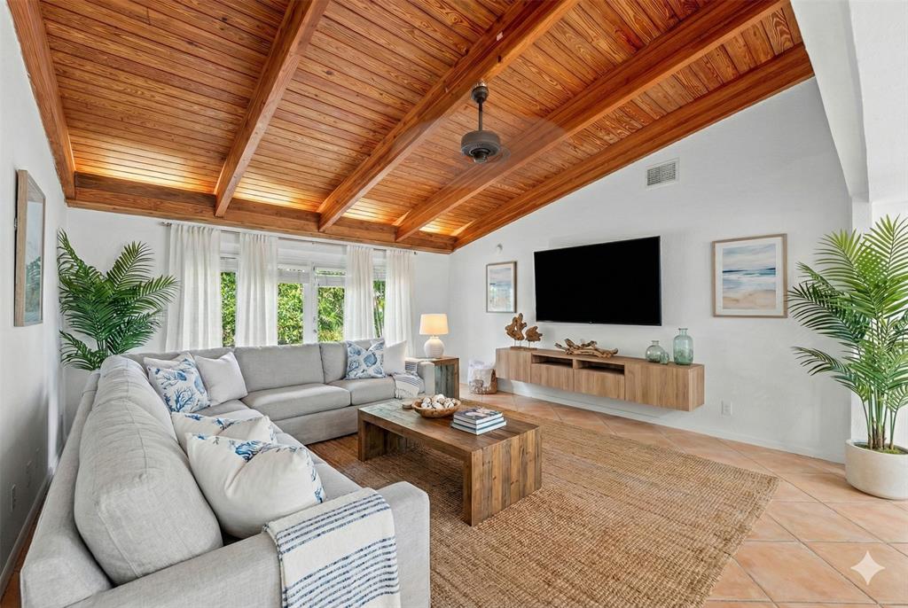 3203 Dover Road Pompano Beach, FL 33062 - Photo 13 of 54 a living room with furniture and a flat screen tv
