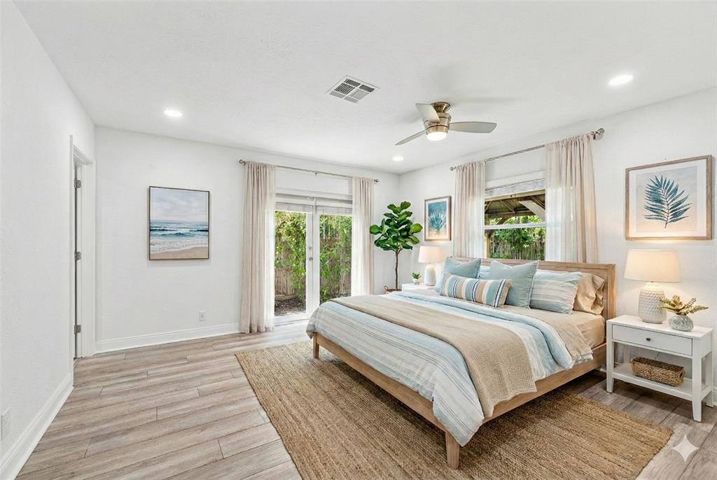 3203 Dover Road Pompano Beach, FL 33062 - Photo 16 of 54 a bedroom with a large bed and a window