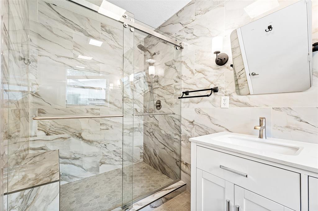 3203 Dover Road Pompano Beach, FL 33062 - Photo 18 of 54 a bathroom with a sink and a shower