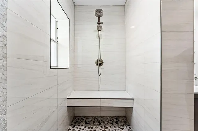 a view of a yard with plants and trees