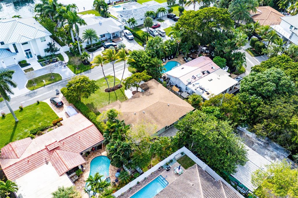 3203 Dover Road Pompano Beach, FL 33062 - Photo 43 of 54 an aerial view of residential house with outdoor space and trees all around