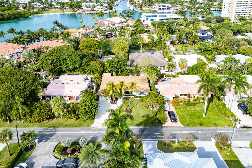 3203 Dover Road Pompano Beach, FL 33062 - Photo 45 of 54 an aerial view of a house with a lake view