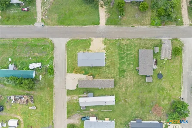 view of a house with a yard