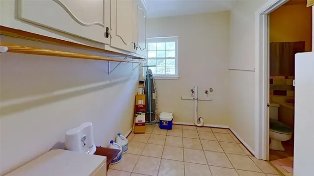 a view of hallway with seating area