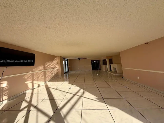 a view of a livingroom with a large window