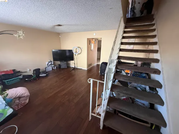 a view of livingroom with furniture and wooden floor