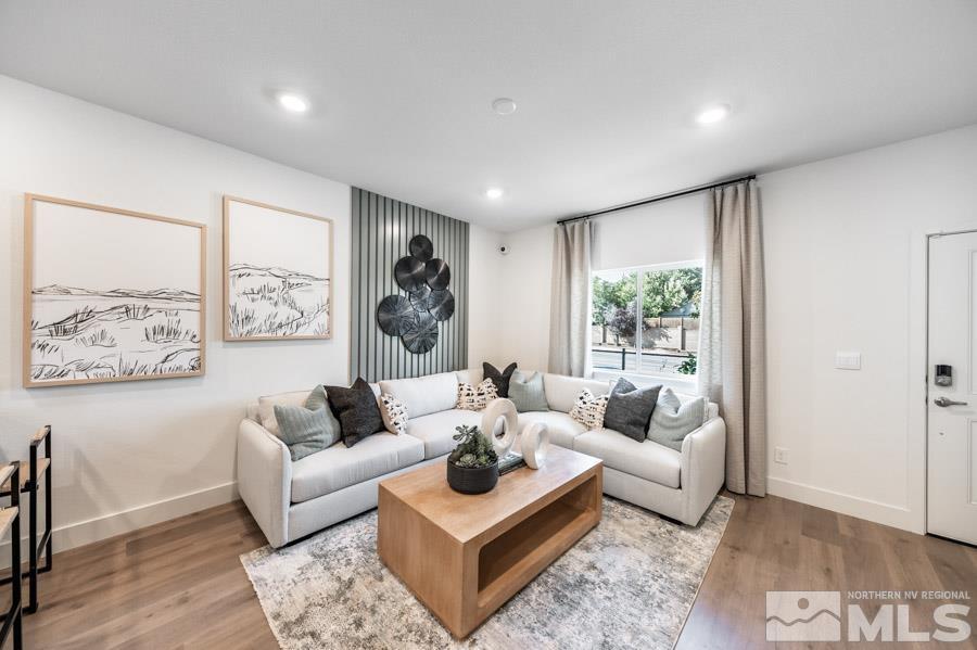 1605 Switchback Street, Unit LOT #29 Reno, NV 89523 - Photo 4 of 20 a living room with furniture and a large window