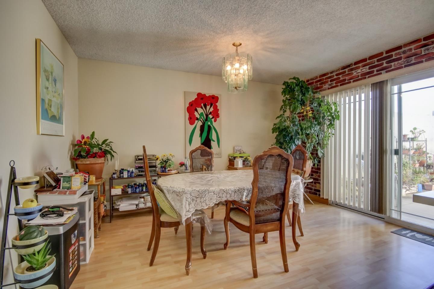 1759 Emerald Drive Salinas, CA 93906 - Photo 11 of 21 a view of a dining room with furniture and a chandelier