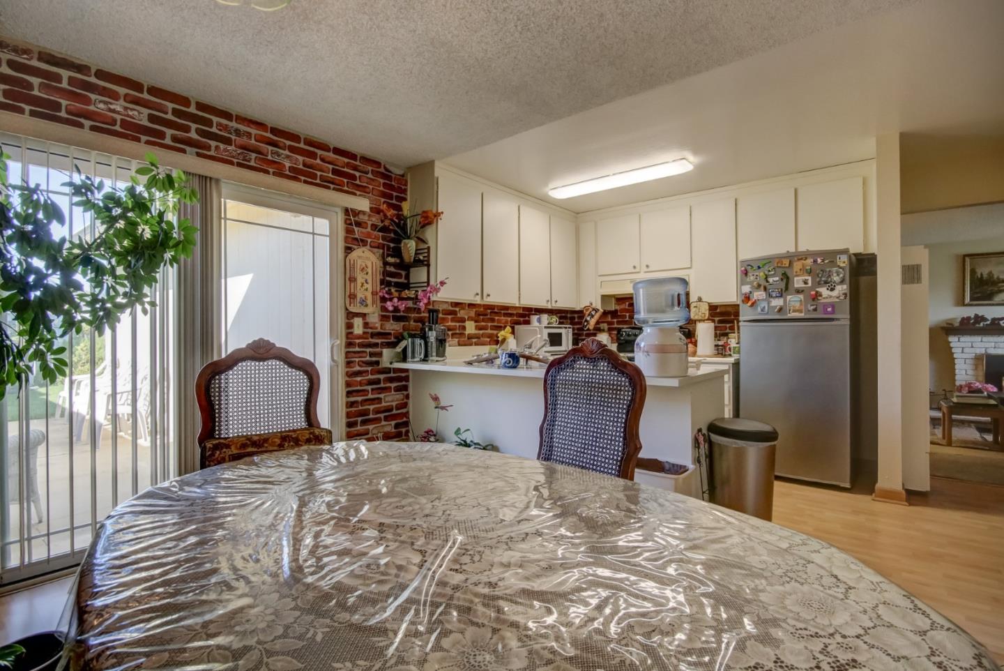 1759 Emerald Drive Salinas, CA 93906 - Photo 12 of 21 a room with a bed and a large window