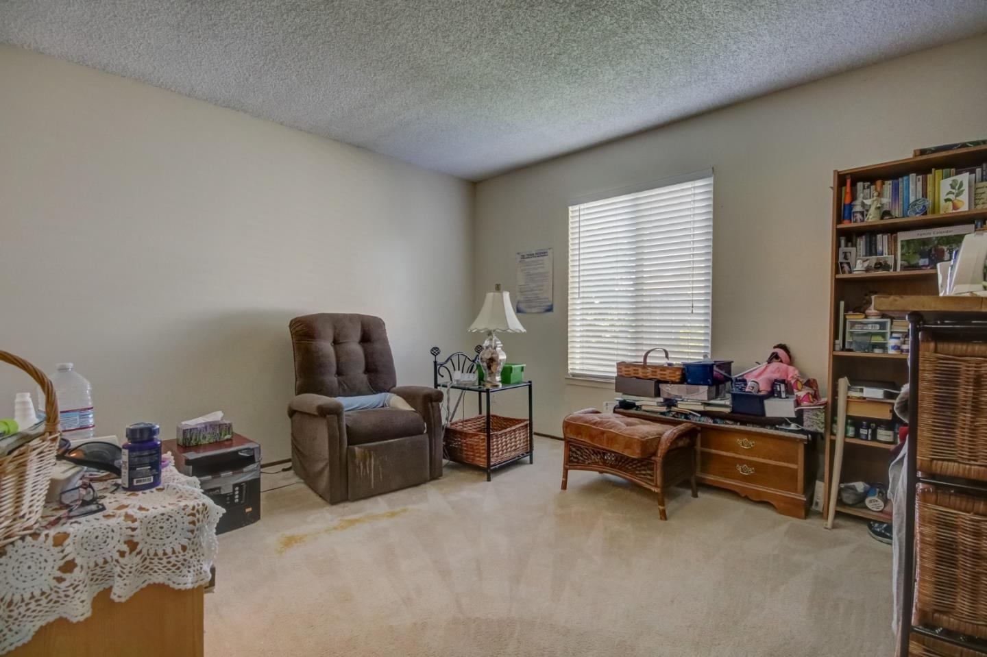 1759 Emerald Drive Salinas, CA 93906 - Photo 14 of 21 a living room with furniture and a flat screen tv
