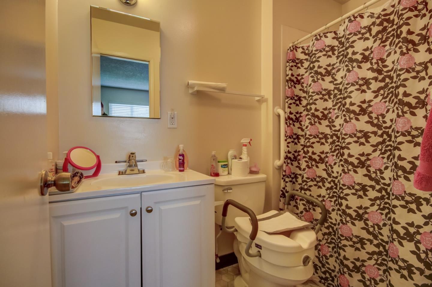 1759 Emerald Drive Salinas, CA 93906 - Photo 16 of 21 a bathroom with a sink toilet and shower