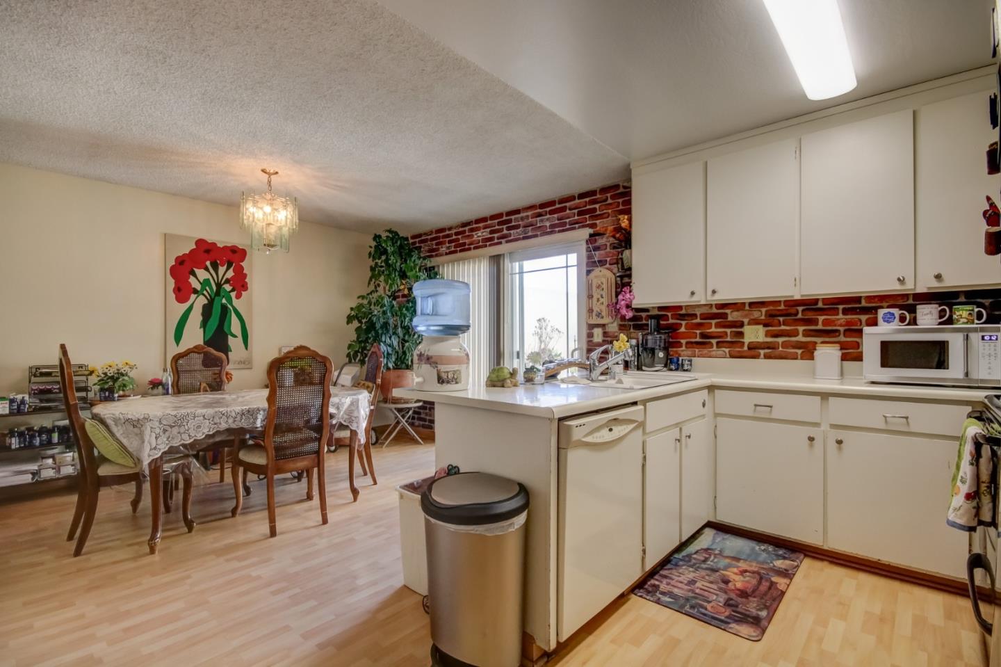 1759 Emerald Drive Salinas, CA 93906 - Photo 8 of 21 a kitchen with a sink and cabinets