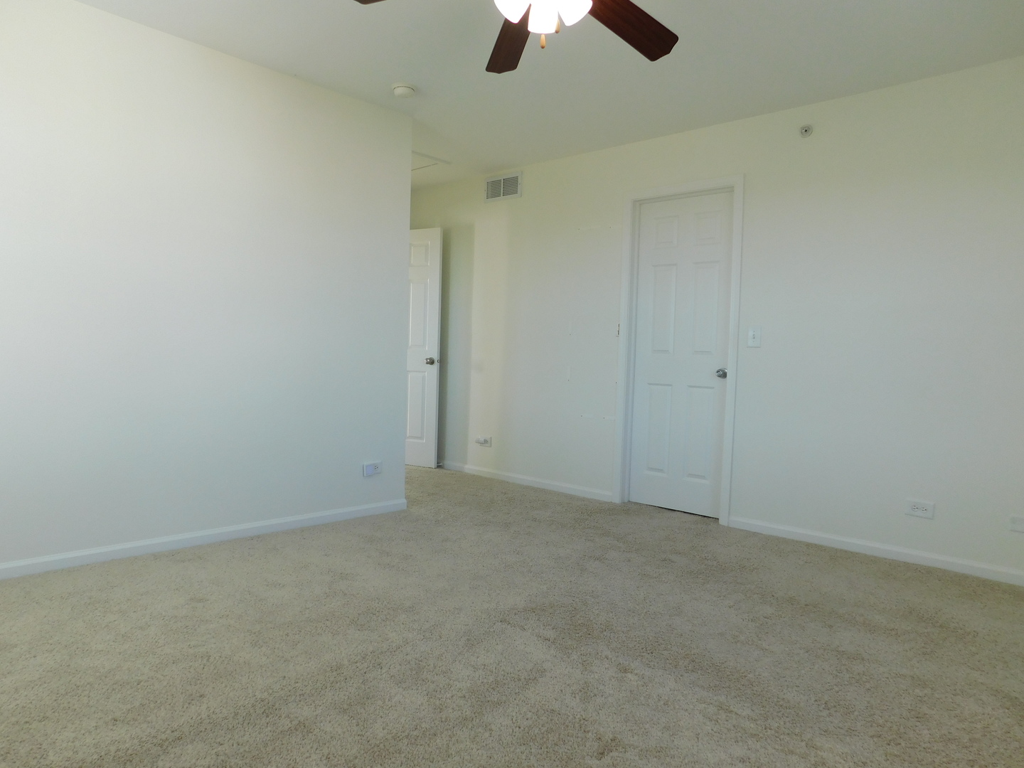 3748 Bailey Road, Unit 3748 Yorkville, IL 60560 - Photo 16 of 27 an empty room with chandelier fan