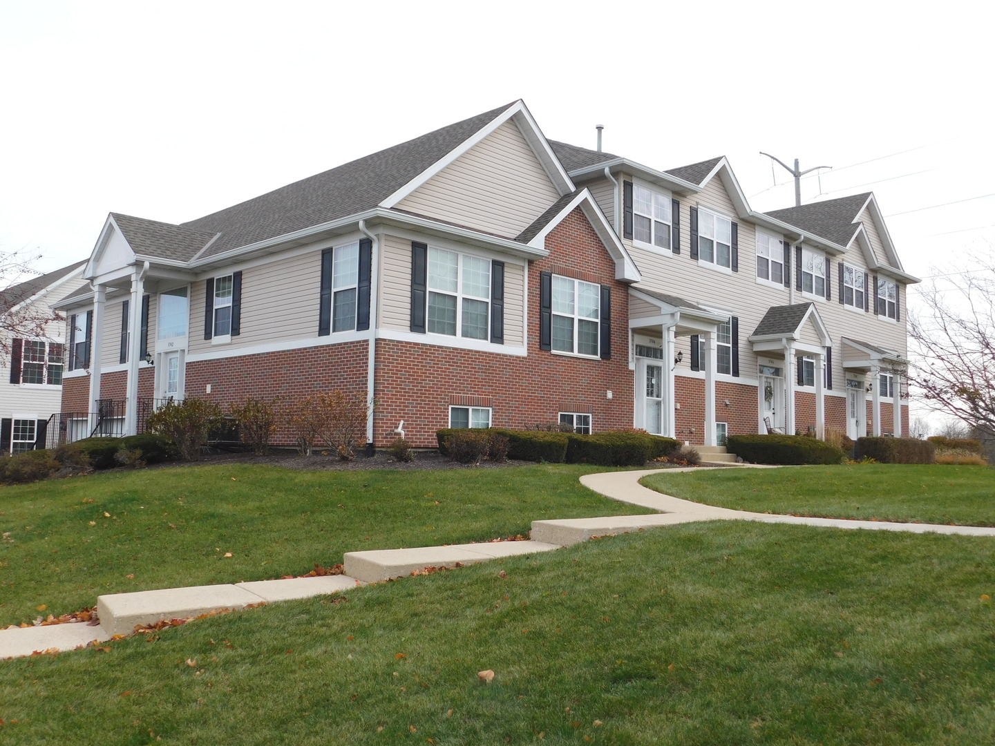 3748 Bailey Road, Unit 3748 Yorkville, IL 60560 - Photo 2 of 27 a front view of a house with a yard