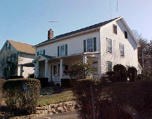 256 Flax Hill Road Norwalk, CT 06854 - Photo 1 of 1 a front view of house with yard