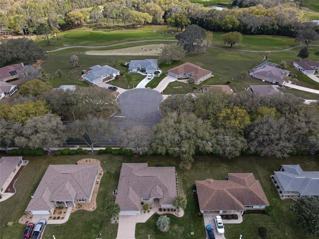 8850 Southeast 140th Place Road Summerfield, FL 34491 - Photo 4 of 98 an aerial view of a house with a lake view