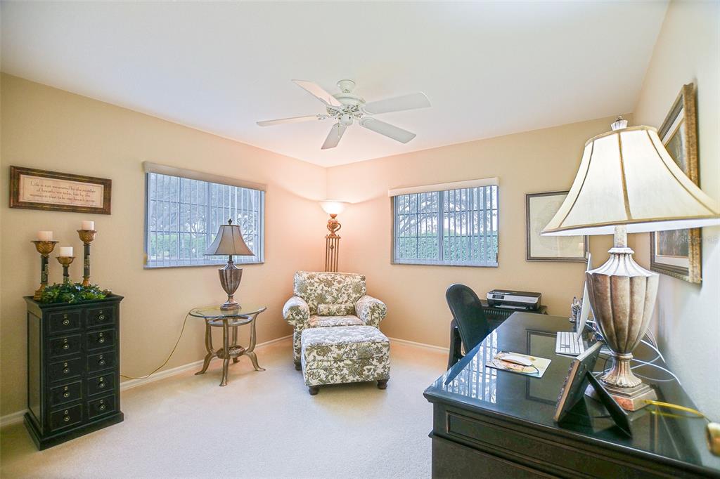 8850 Southeast 140th Place Road Summerfield, FL 34491 - Photo 58 of 98 a living room with furniture and a window
