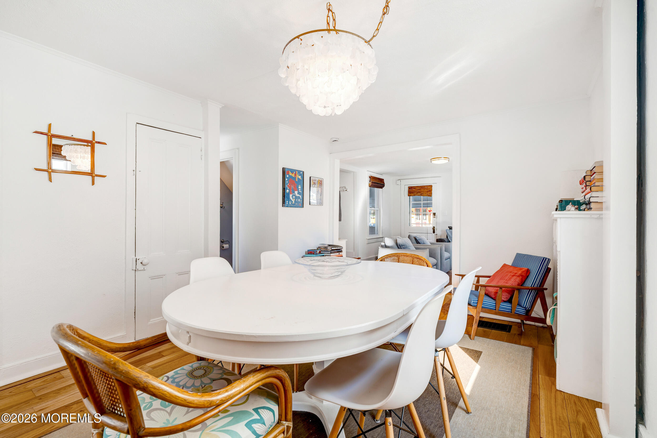 100 Mt Tabor Way Ocean Grove, NJ 07756 - Photo 13 of 34 a dining room with furniture and a chandelier