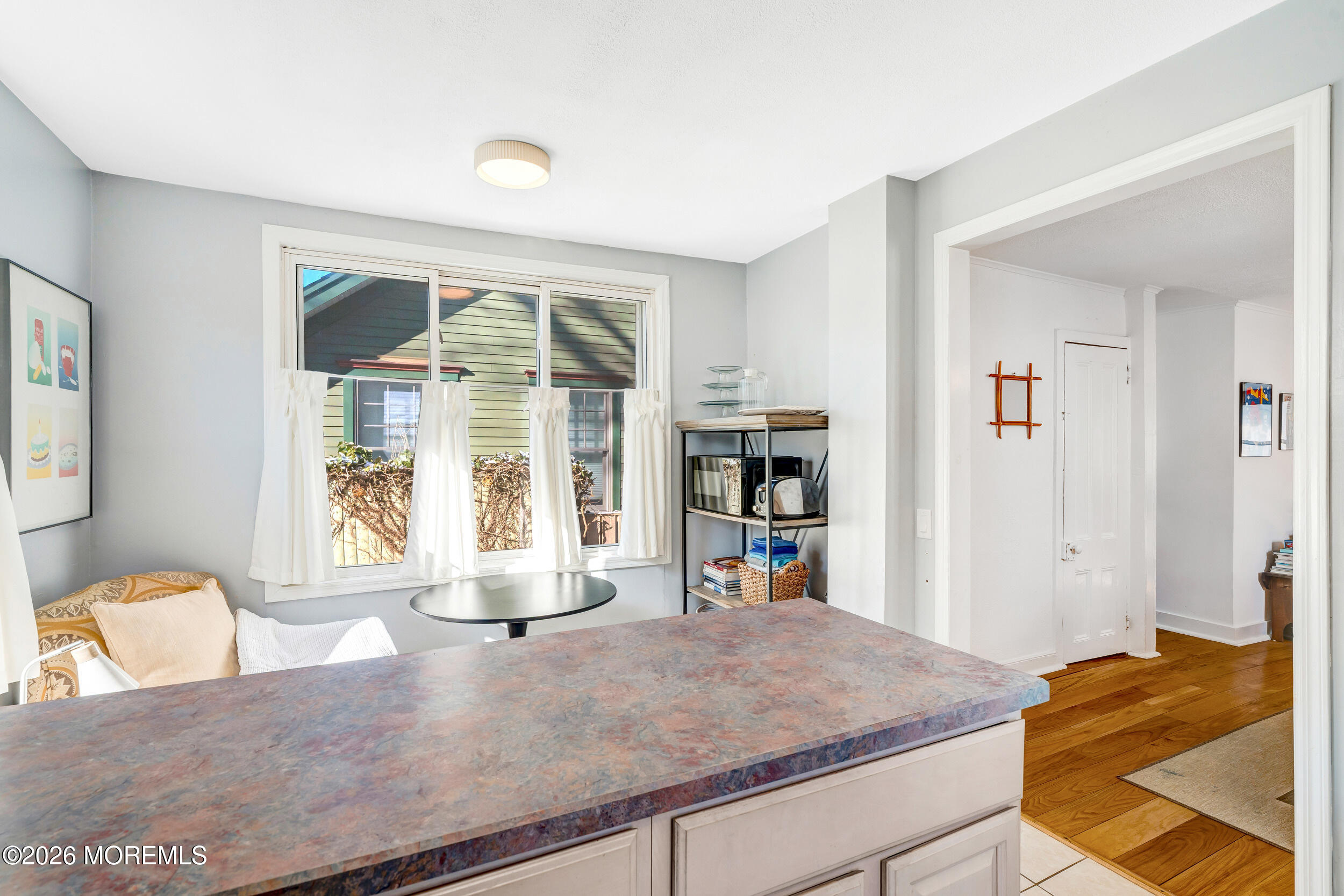 100 Mt Tabor Way Ocean Grove, NJ 07756 - Photo 16 of 34 a living room with hard wood flooring and a couch