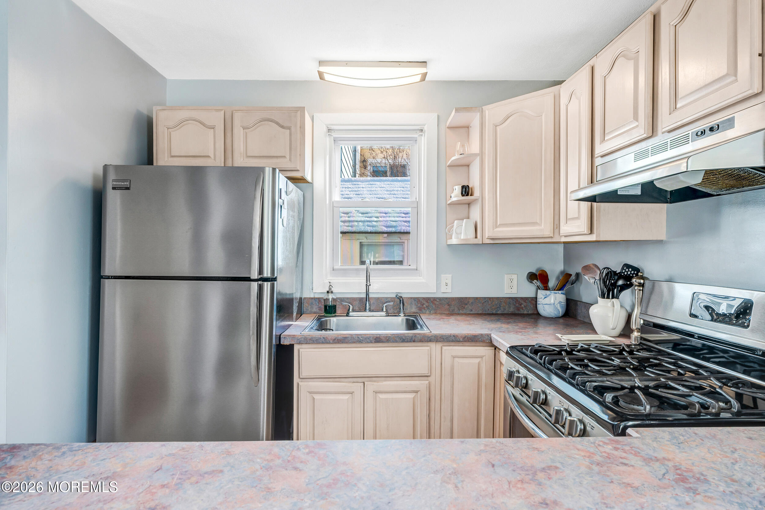 100 Mt Tabor Way Ocean Grove, NJ 07756 - Photo 22 of 34 a kitchen with stainless steel appliances granite countertop a refrigerator stove and a sink
