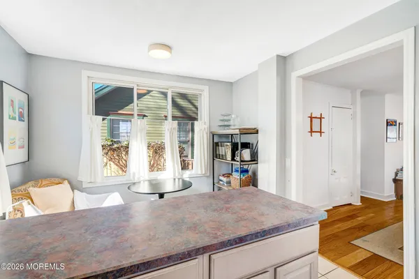 a kitchen with stainless steel appliances granite countertop a refrigerator stove and a sink