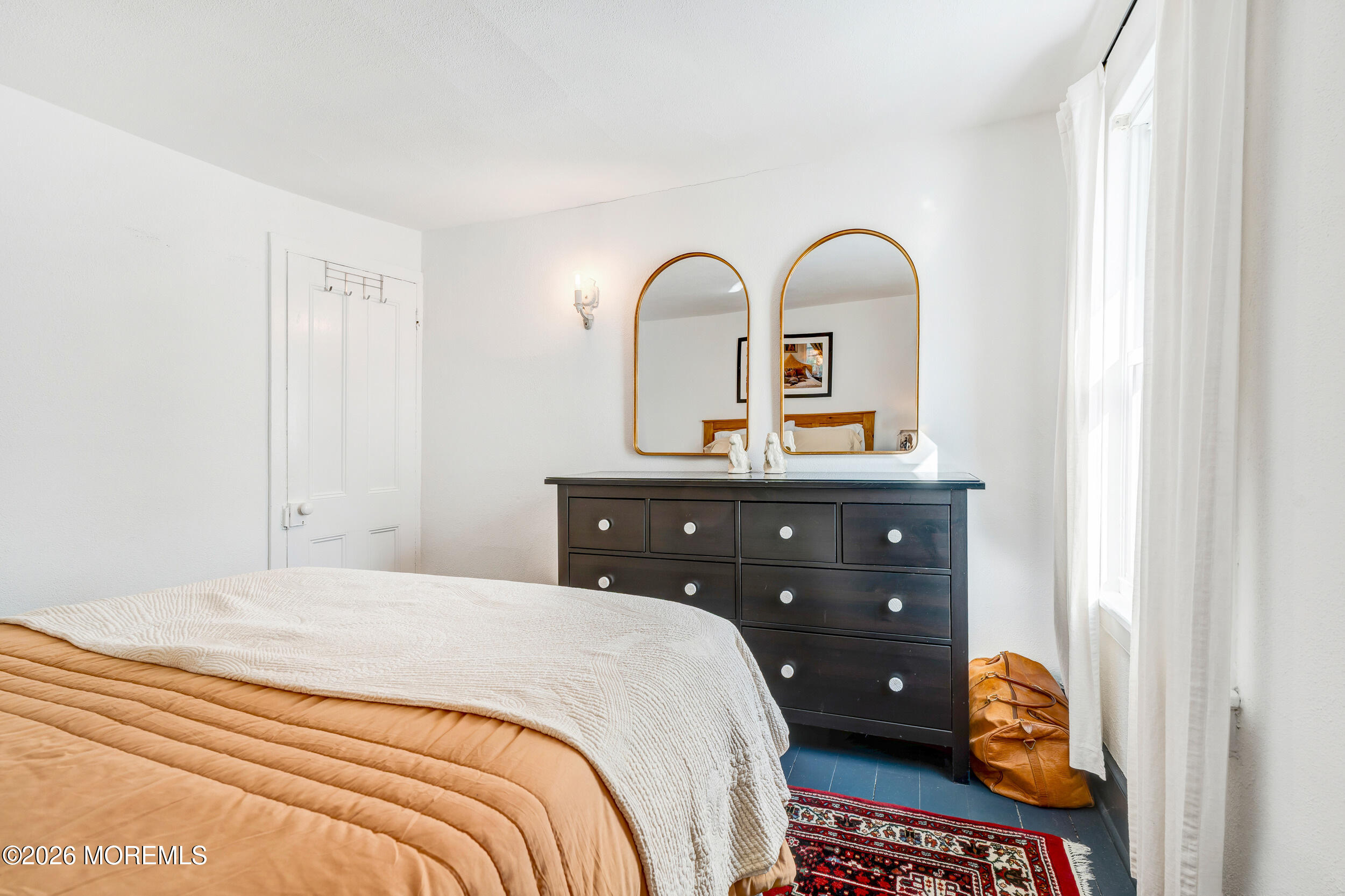 100 Mt Tabor Way Ocean Grove, NJ 07756 - Photo 31 of 34 a bedroom with a bed and a dresser