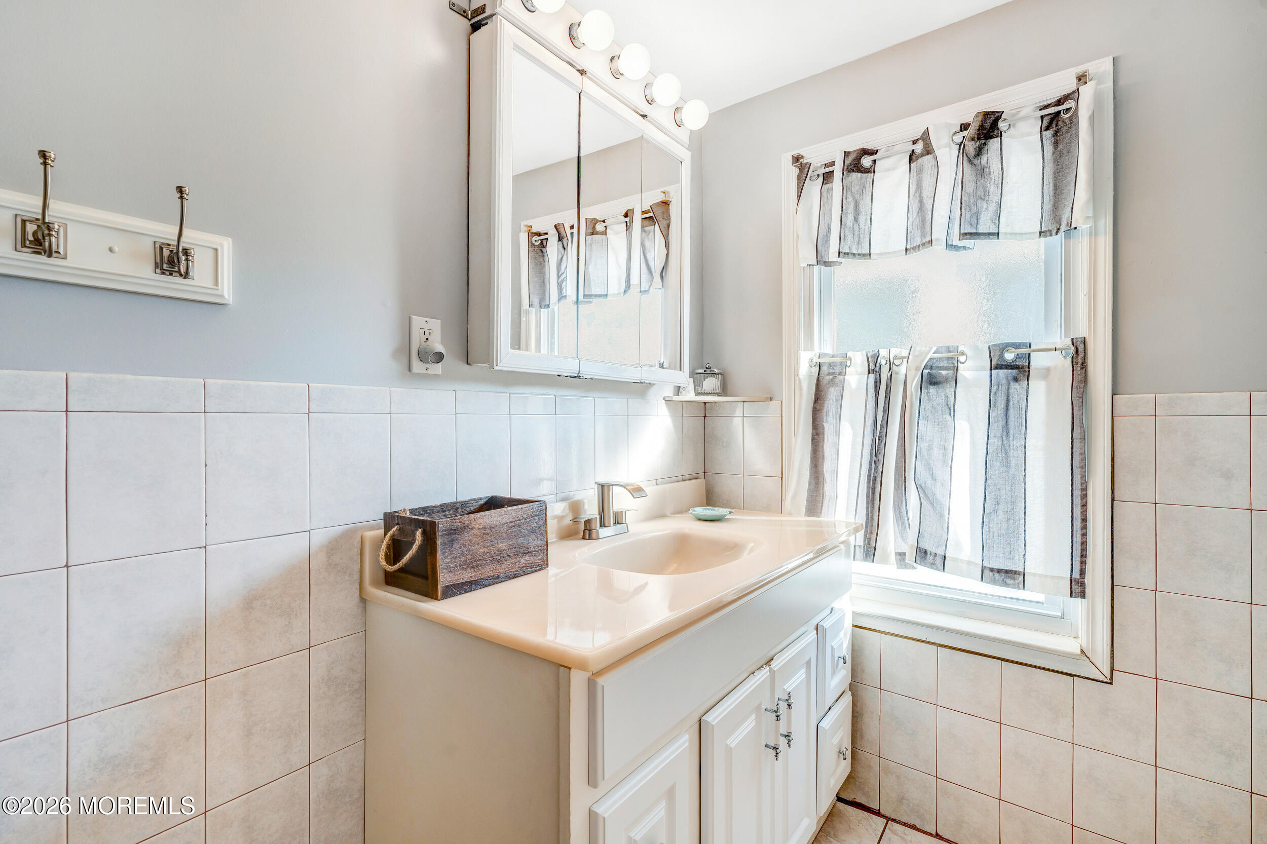 100 Mt Tabor Way Ocean Grove, NJ 07756 - Photo 33 of 34 a kitchen with a sink cabinets and a window