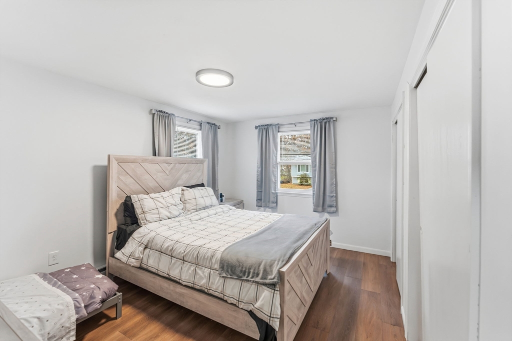 26 Wakefield Avenue Webster, MA 01570 - Photo 15 of 42 a bedroom with a bed and window