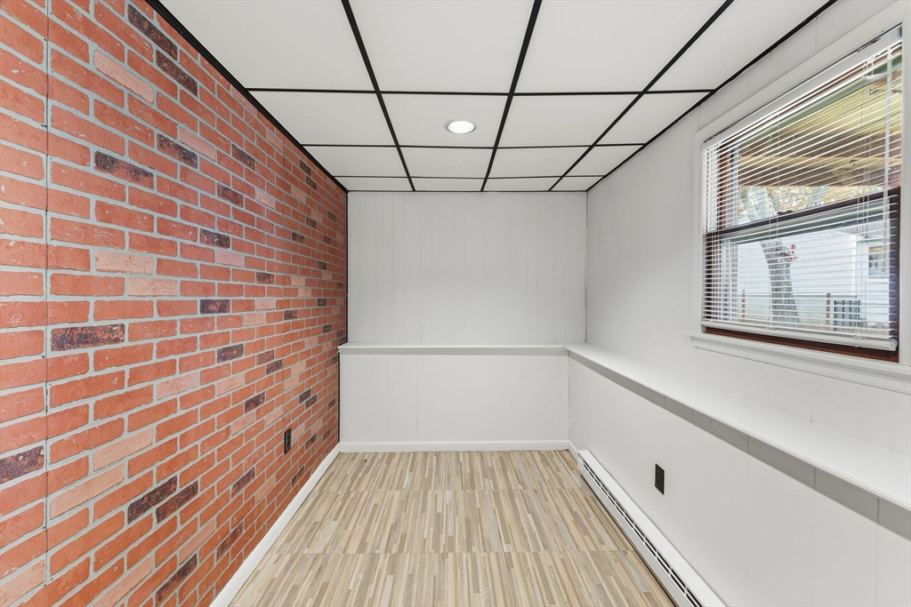 26 Wakefield Avenue Webster, MA 01570 - Photo 29 of 42 a view of a room with wooden floor and windows